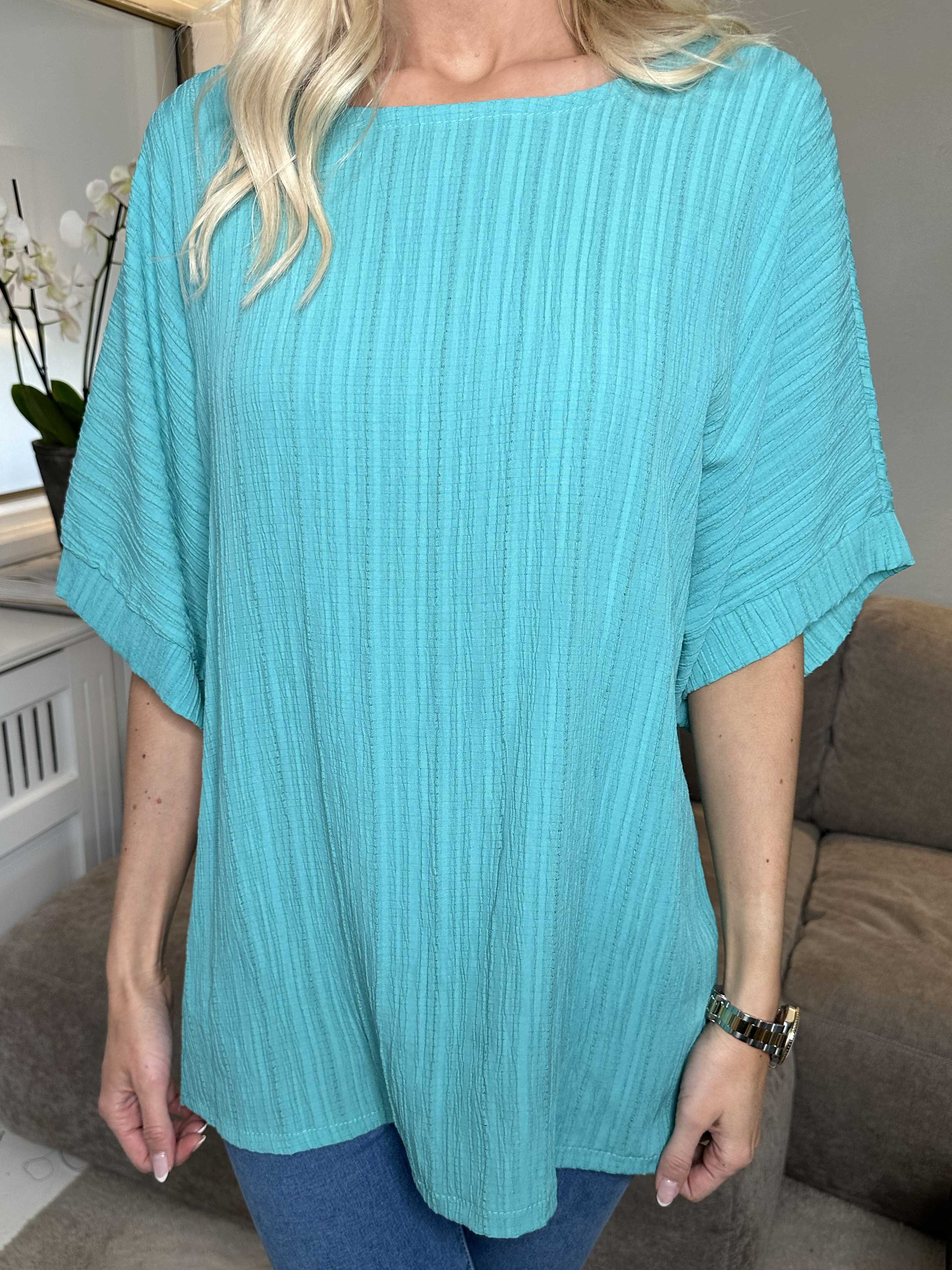 Cindy - Ensfarvet bluse i crepet look